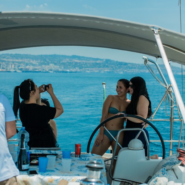 people taking a picture on boat