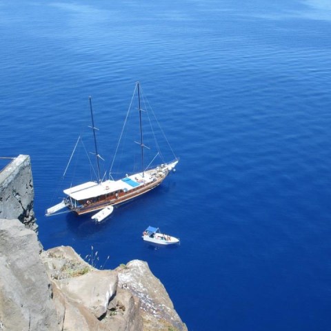 a small boat in a body of water