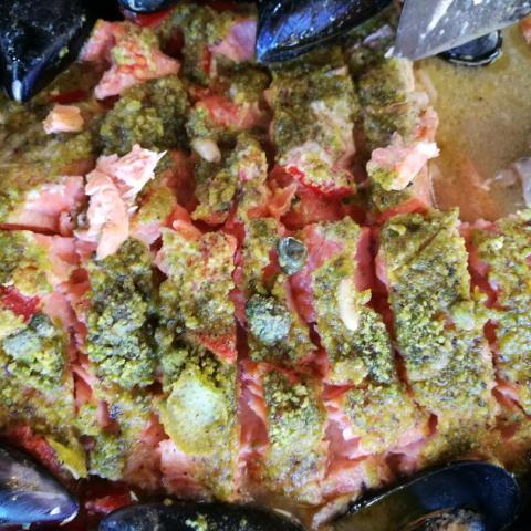 a pizza sitting on top of a pan