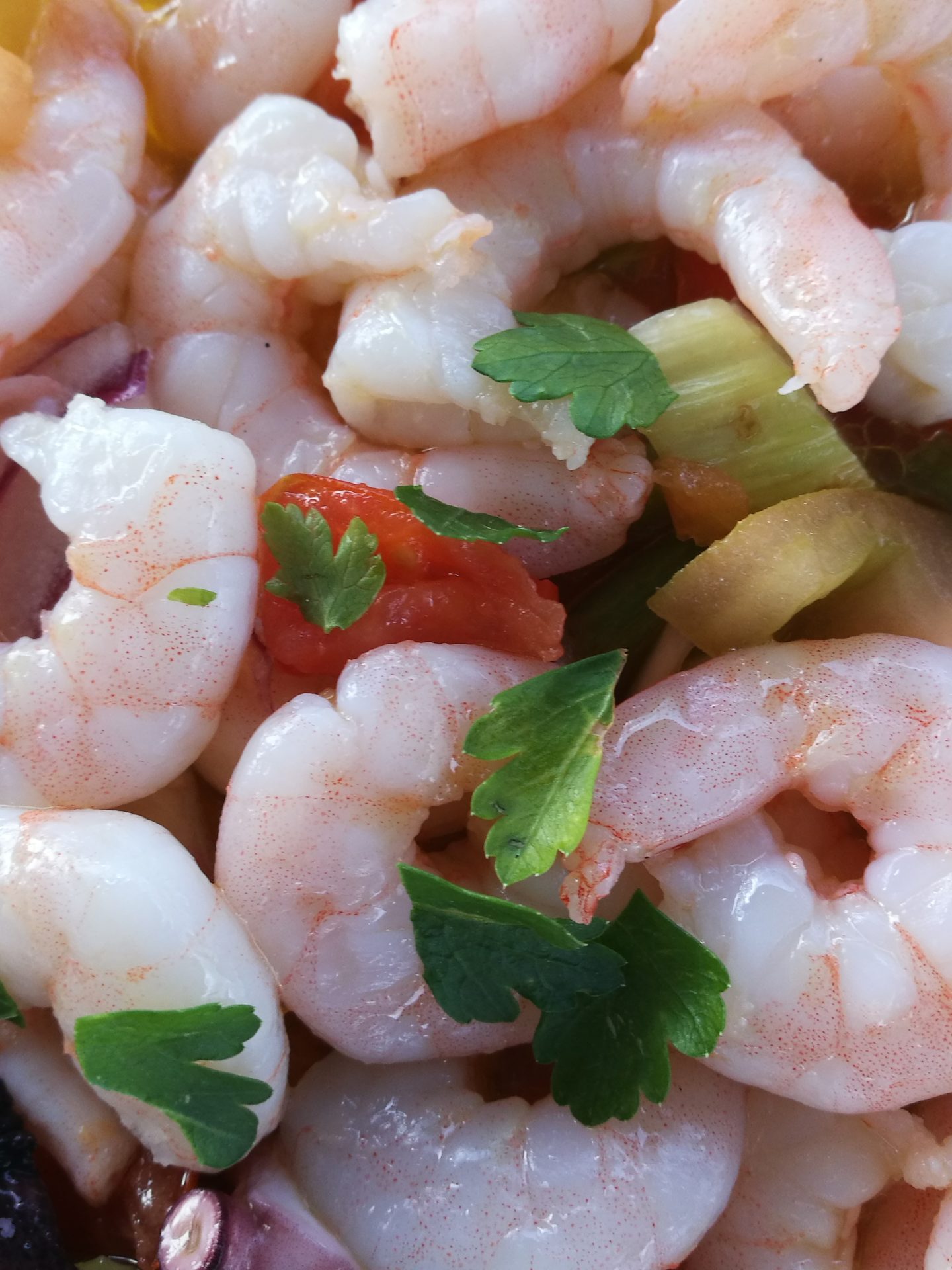 a pile of shrimp and vegetables