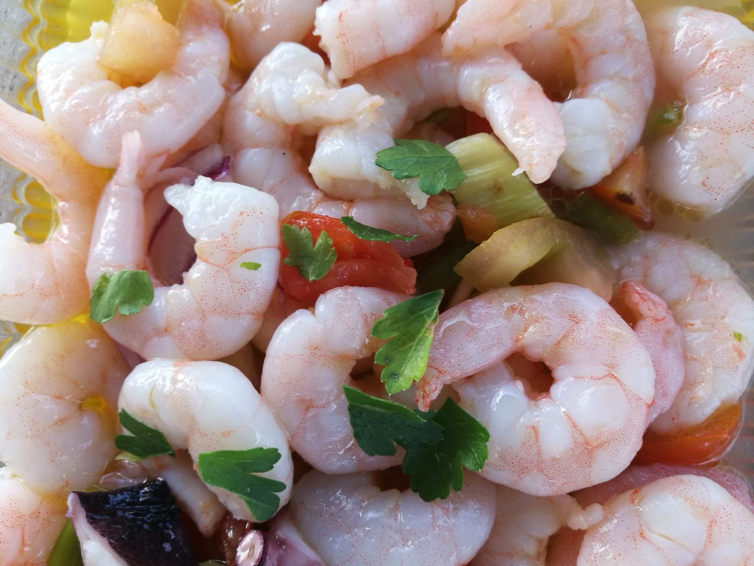 a pile of shrimp and vegetables