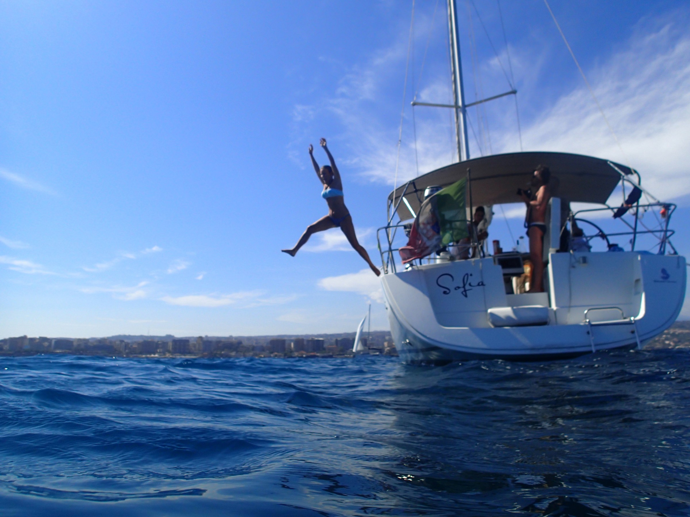 a small boat in a body of water