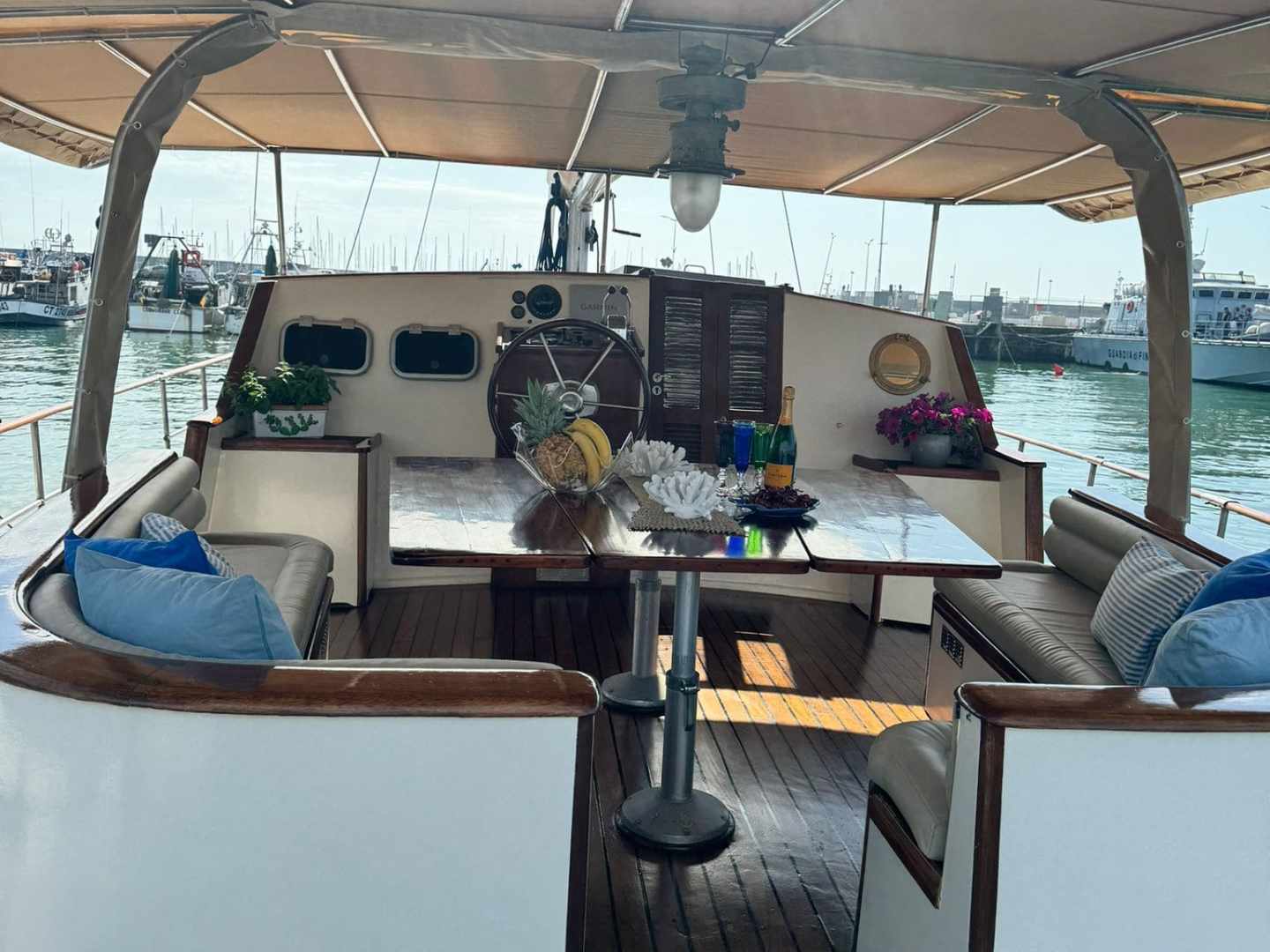 a table topped with a blue chair