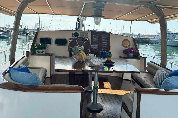 a table topped with a blue chair