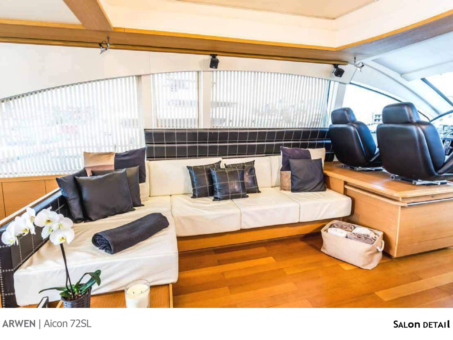 a living room filled with furniture and a large window