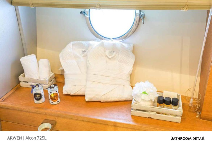 a bedroom with a bed and a mirror