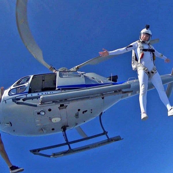 a person riding on the back of a boat