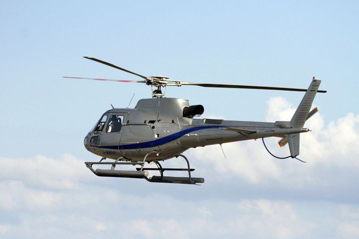 a helicopter flying in the sky