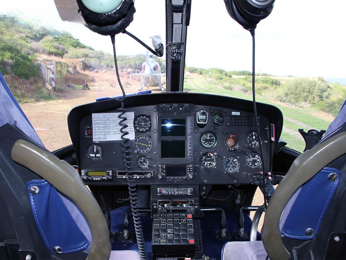 a motorcycle parked on the side of a vehicle