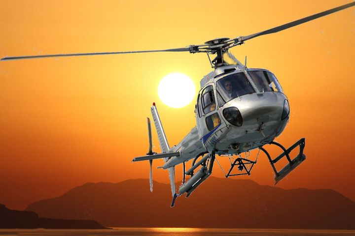 a helicopter flying in the sky