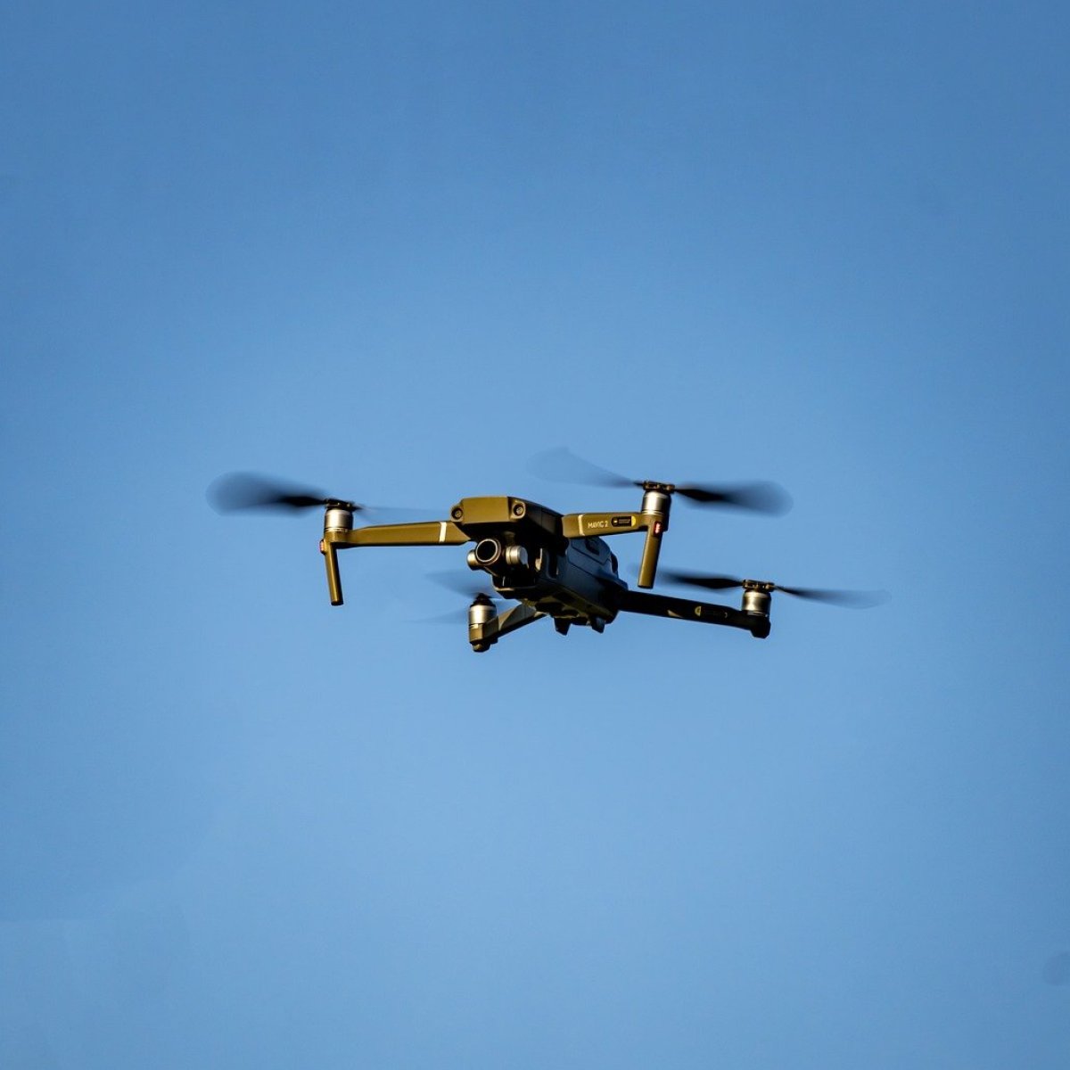 a large airplane flying high up in the air