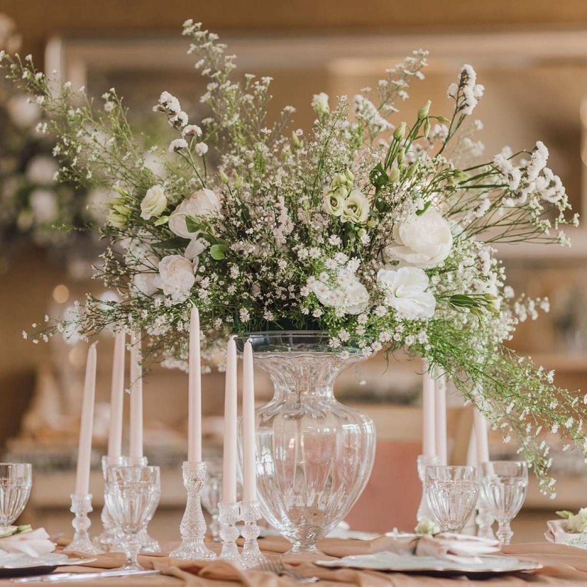 a vase of flowers on a table