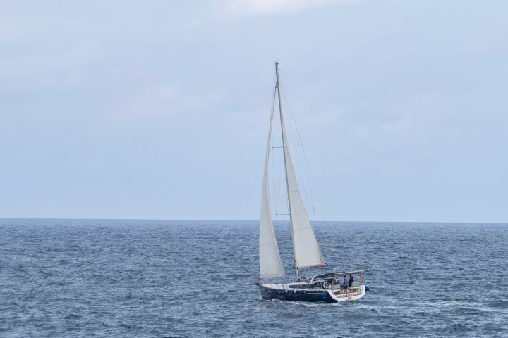 a small boat in a body of water