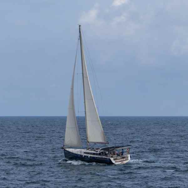 a small boat in a large body of water