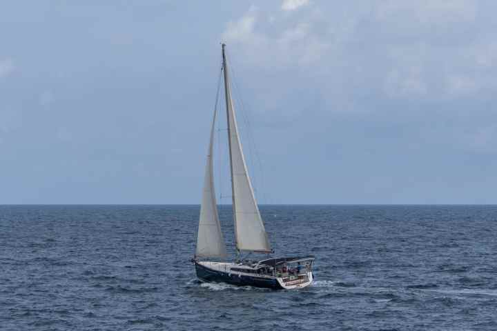 a small boat in a large body of water