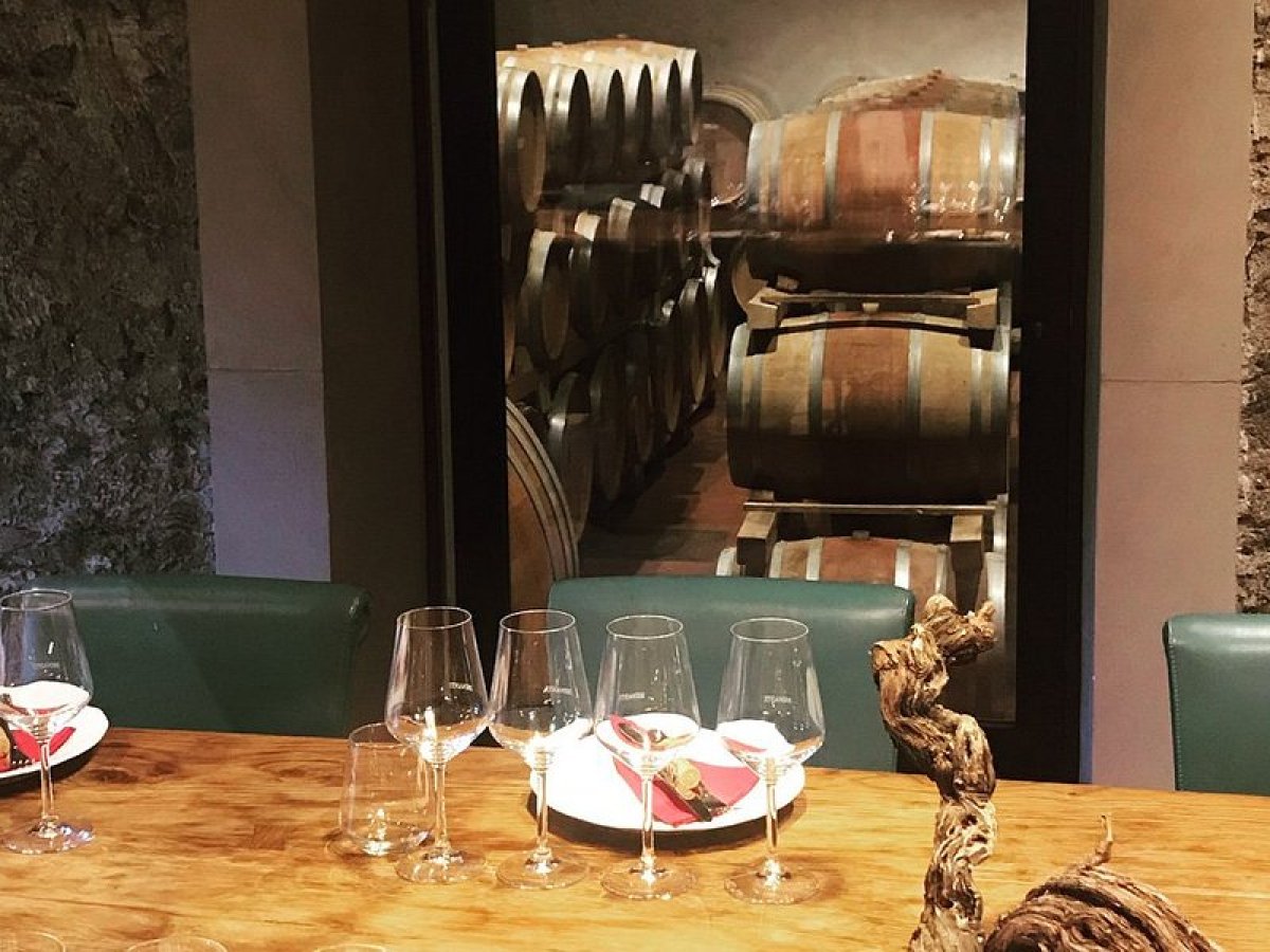 a glass of wine on a table