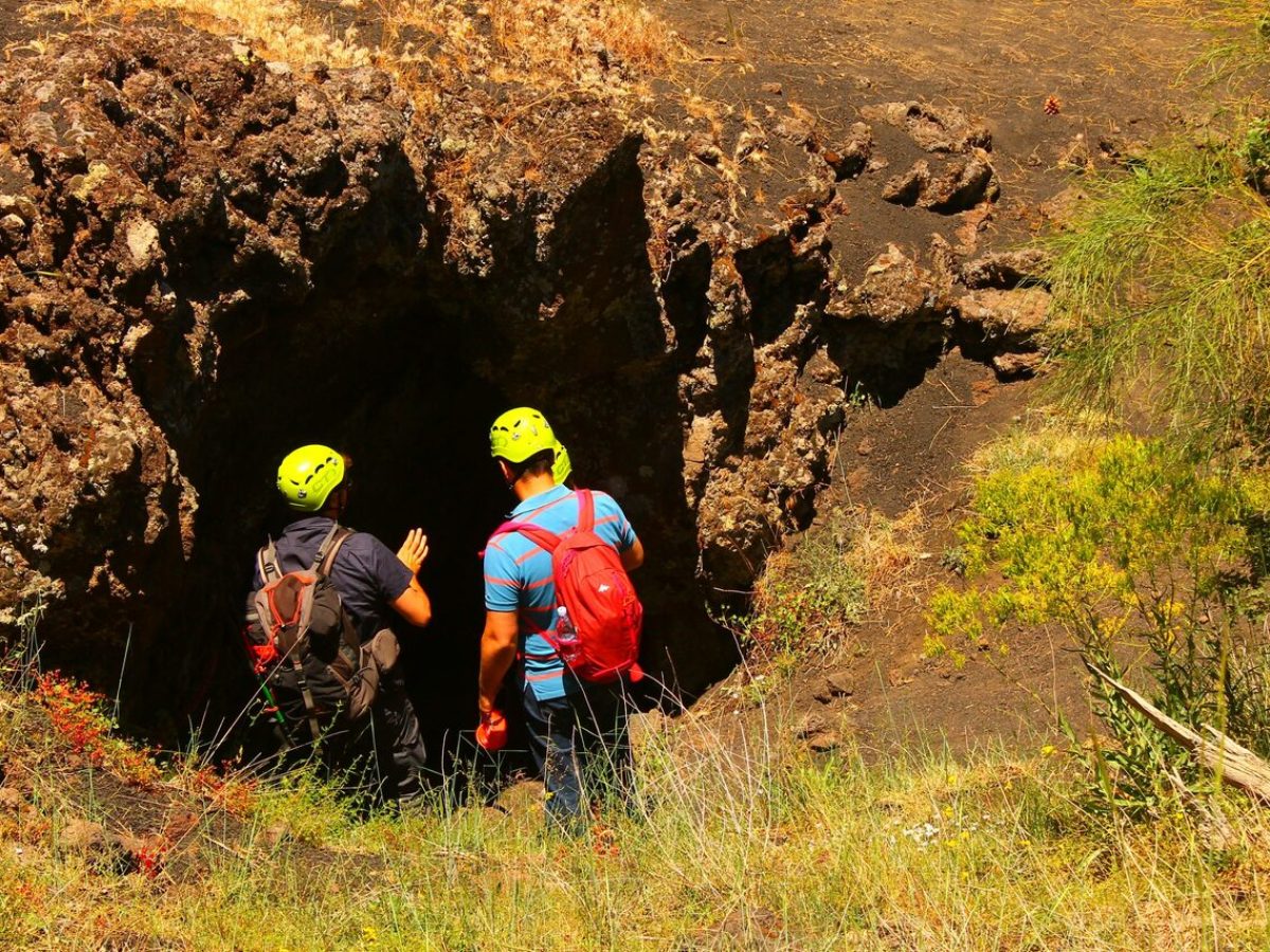 a person standing next to a fire hydrant