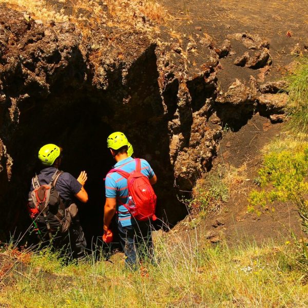 a person standing next to a fire hydrant