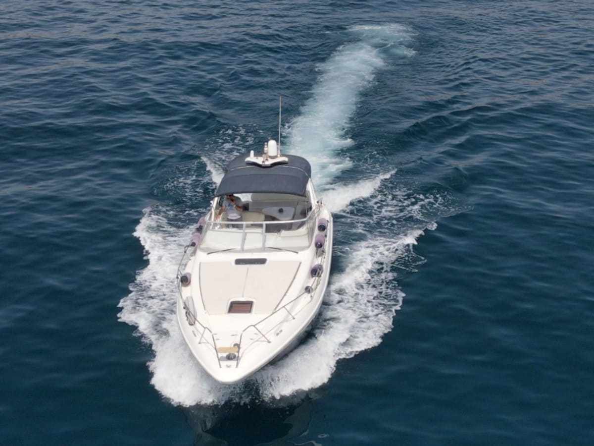 a small boat in a body of water