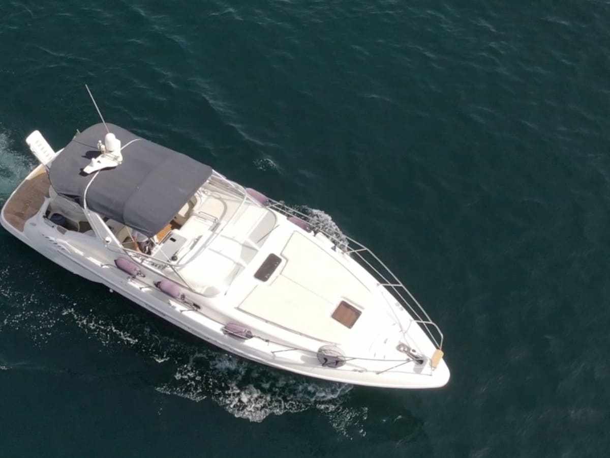 a small boat in a body of water