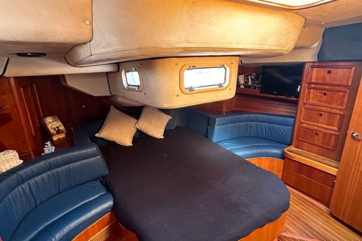 a table topped with a blue chair