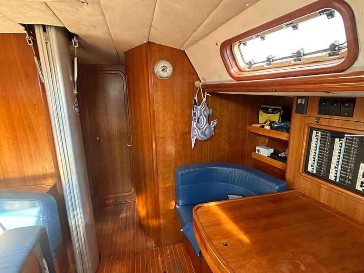 a chair sitting in front of a wooden table