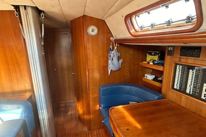a chair sitting in front of a wooden table
