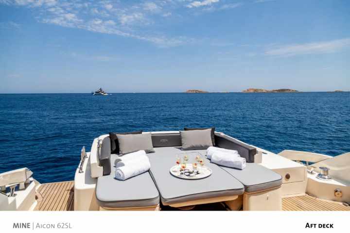 a boat sitting next to a body of water