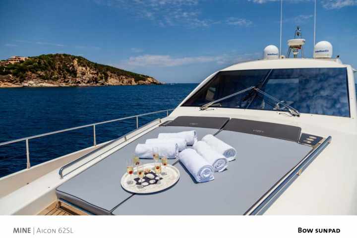 a boat is docked next to a body of water