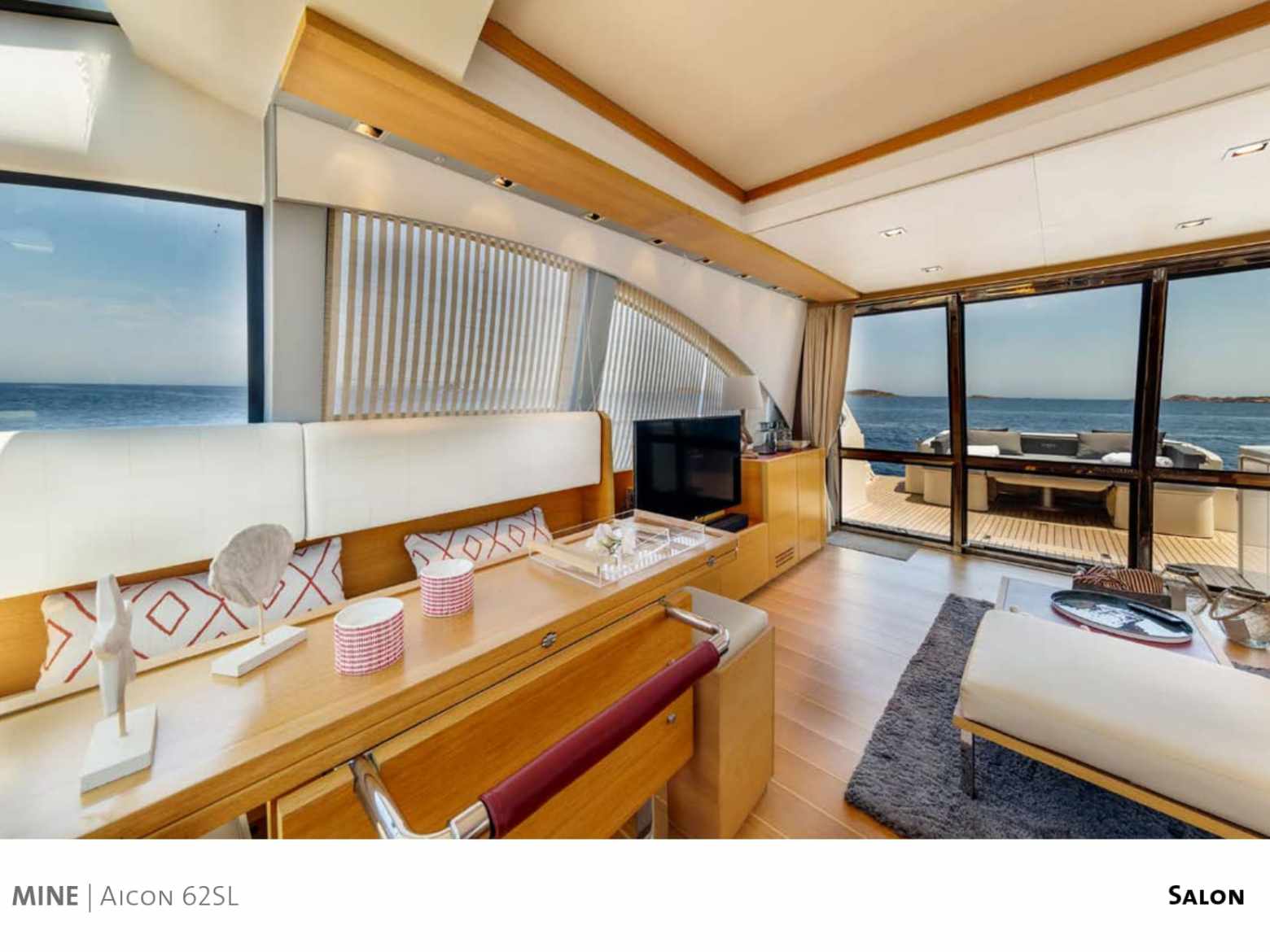 a bedroom with a bed and desk in a room