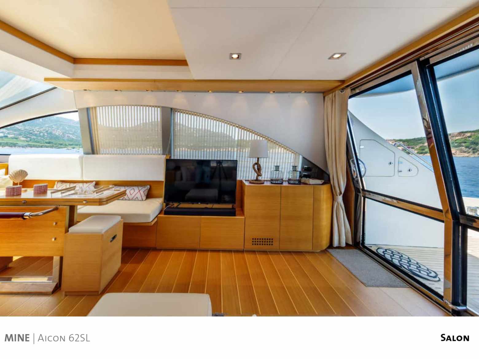 a room filled with furniture and a large window