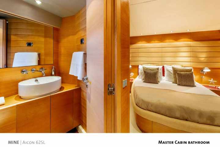 a bedroom with a large mirror