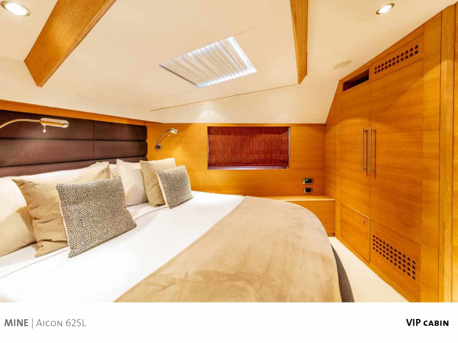 a bedroom with a bed and desk in a room