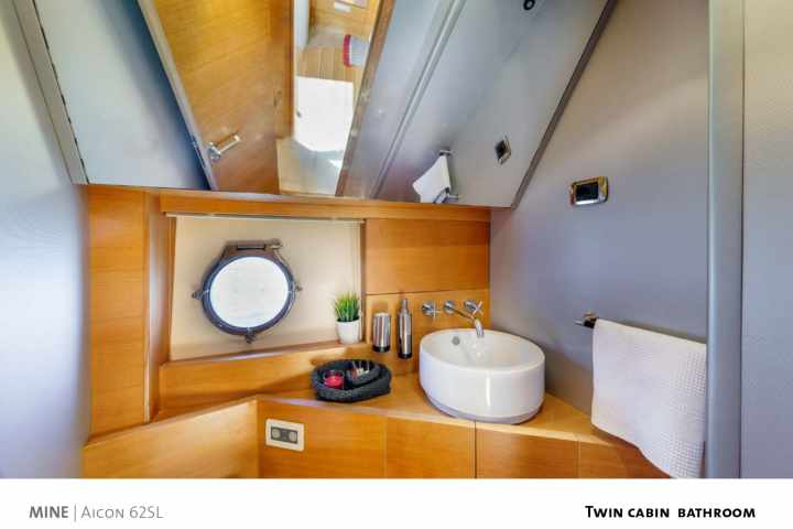 a room with a sink and a mirror