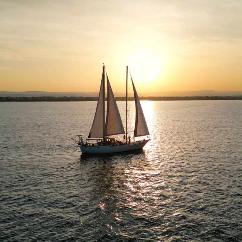 a small boat in a large body of water