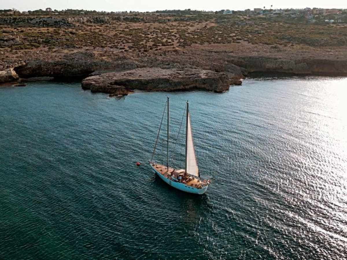 a small boat in a body of water