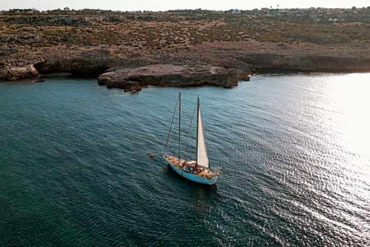 a small boat in a body of water