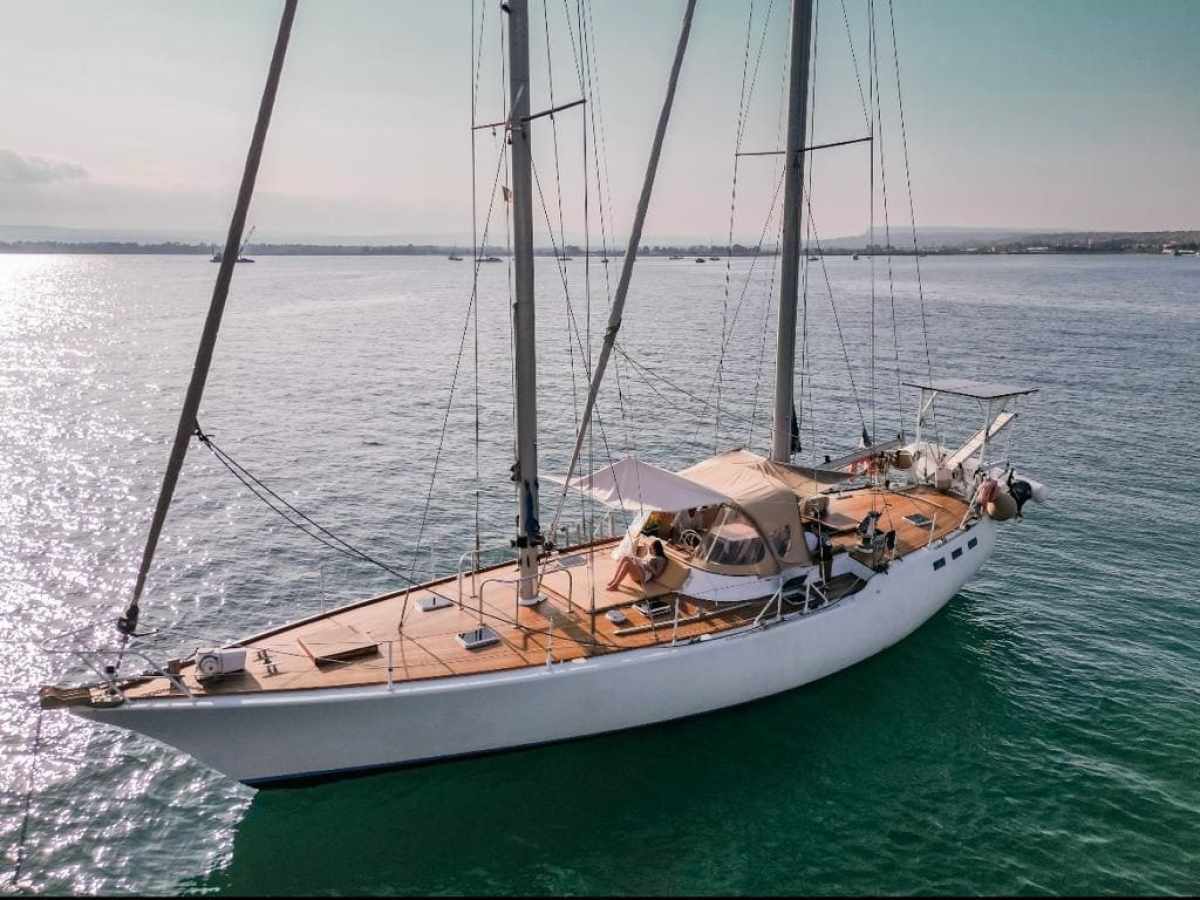 a small boat in a body of water