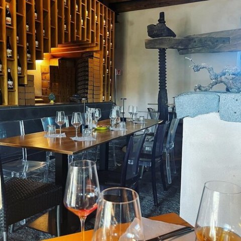 a kitchen with a dining table in a restaurant