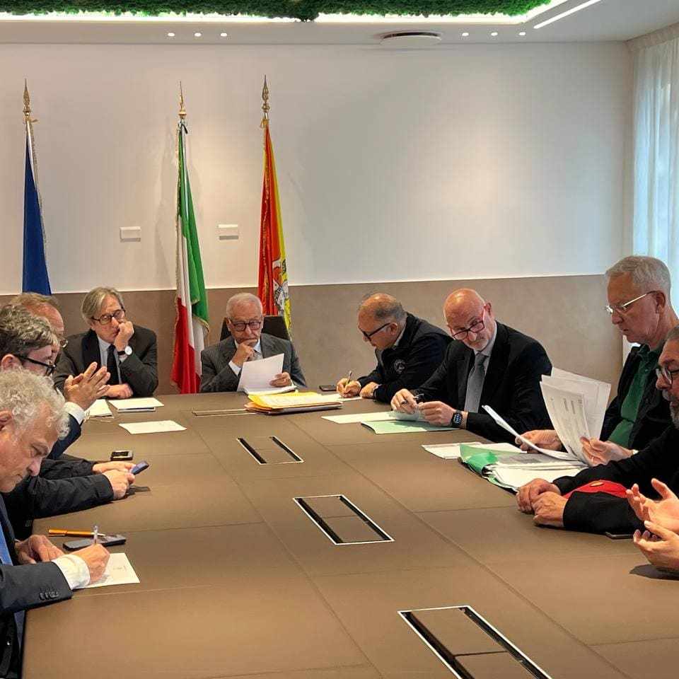 a group of people sitting at a table