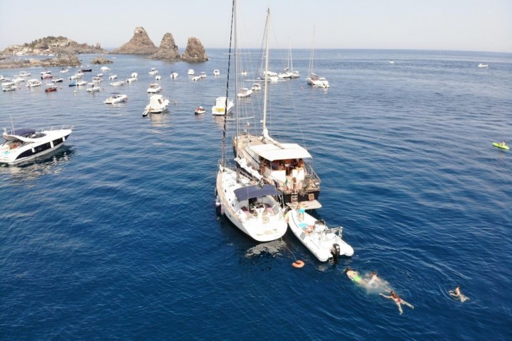 a small boat in a large body of water