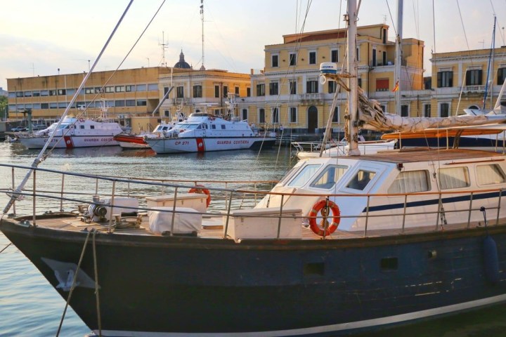 a boat docked at a dock