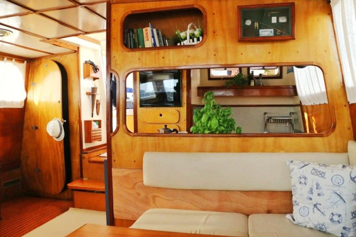 a kitchen with wooden cabinets and a sink