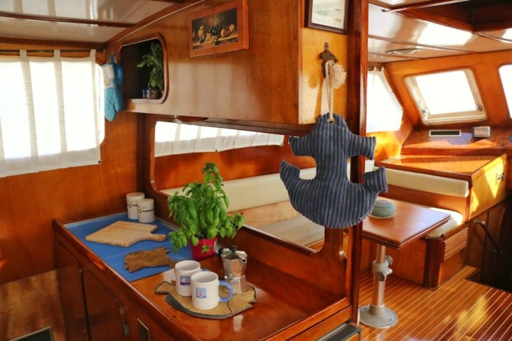 a room filled with furniture and a tv on a table